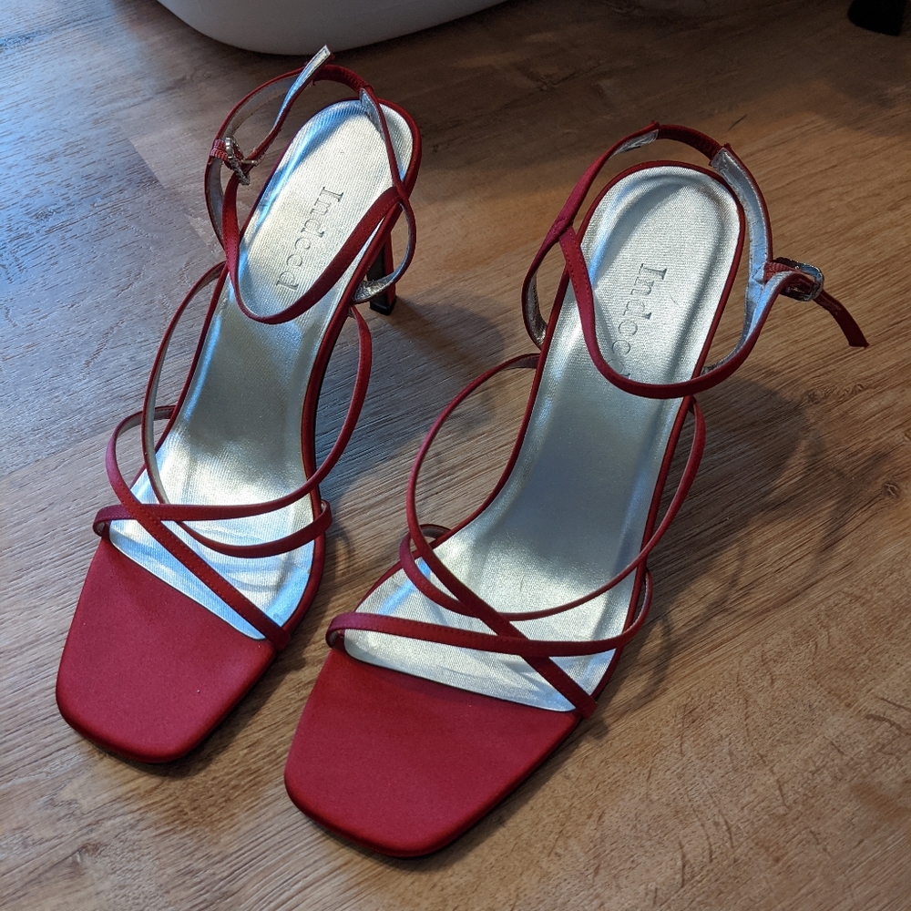 Red strappy heels